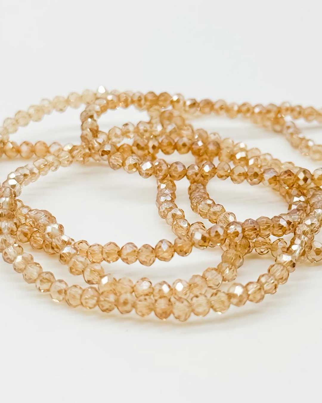 Kristallperlenarmband von Liebeslicht Perlenzauber in Beige mit klaren Perlen