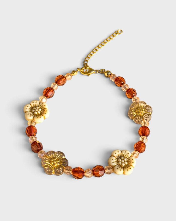 Herbstblumensonne – verstellbares Perlenarmband mit Edelstahlverschluss